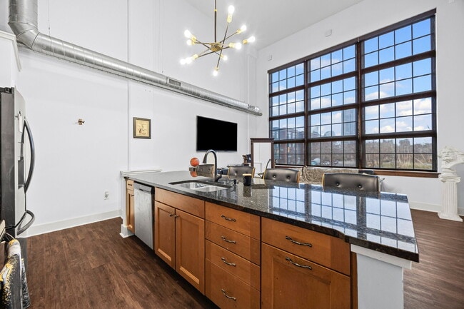 Urban Loft Condo Featuring Stunning Views & Rooftop Entertaining