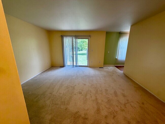 Living room with new carpet in 2026 - 3234 Bolgos Cir Unit 3234 Bolgos Circle