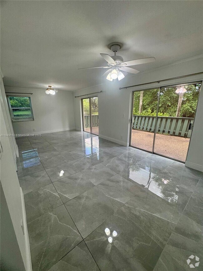Building Photo - 8921 NW 28th Dr Unit 64 Rental