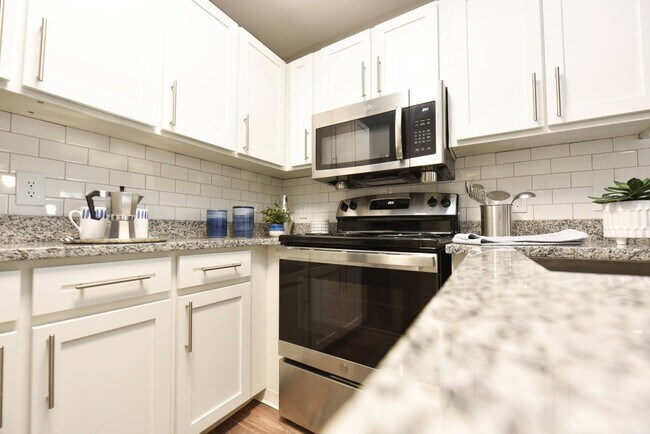 Kitchen with Backsplash + Modern Cabinetry