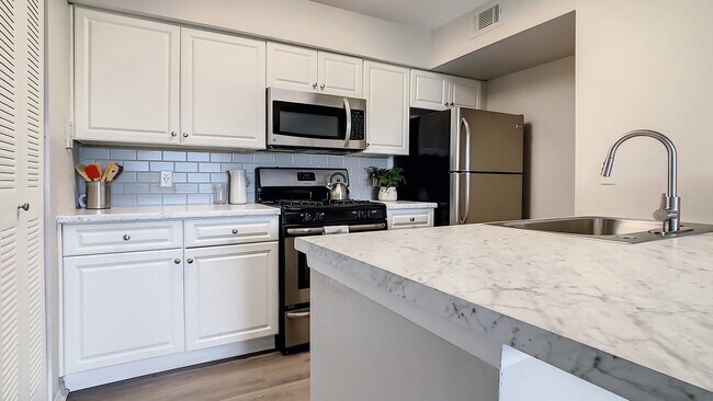 Featuring stainless steel appliances, bright cabinetry, and a spacious breakfast bar, our kitchens combines contemporary finishes with practical functionality.
