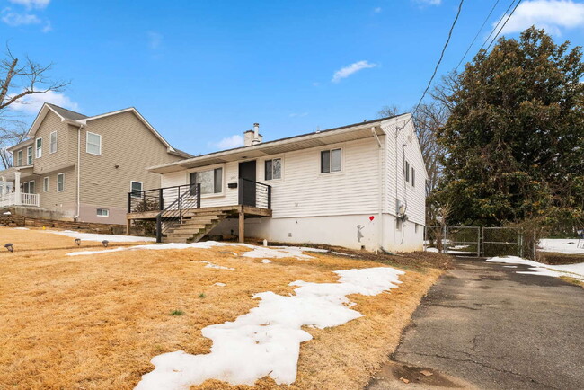 Photo - Spacious Single-Family Home with Versatile Living Spaces