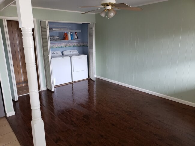 Living area #1 with laundry area - 703 NW 7th St