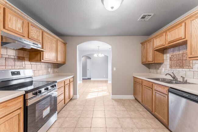 Photo - Charming 3-Bedroom Home with Backyard & Ga...