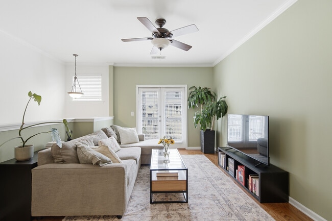 Living room with balcony view - 1225 Liberty Pky NW