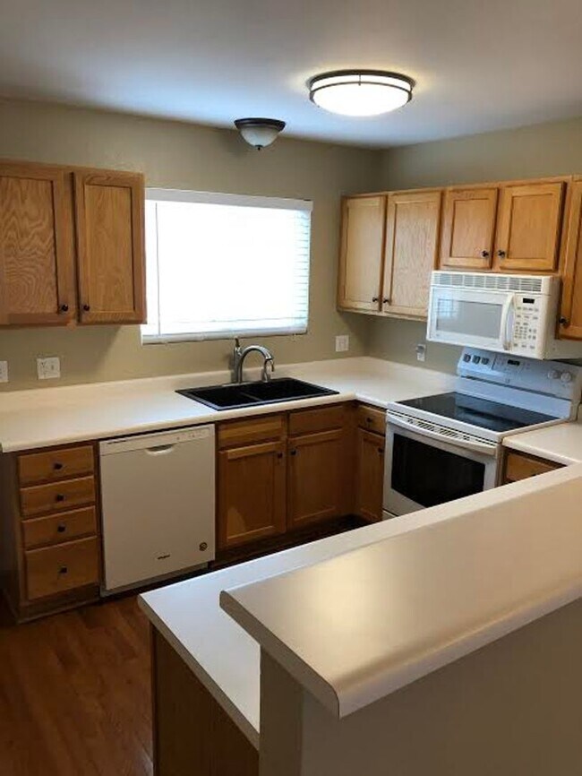 Photo - Beautiful 2bd, 2 ba 1,365 sq. ft. Condo, New Paint and Carpet, Fenced Yard, Close to Everything