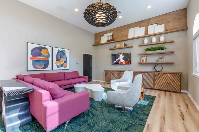 The-Greens-at-Tryon-Apartments-in-Raleigh-NC-Resident-Clubhouse-Lounge-Seating-with-TV