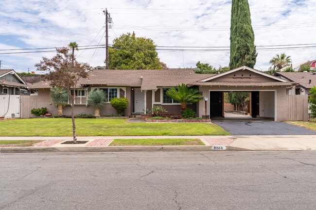 Charming Updated Home With Drive-Through Garage Access
