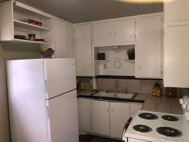 Photo - Available Now! 3/1 with carport!