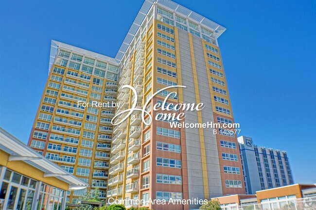 Building Photo - Coming Soon - High-rise Montage - Extra La... Rental