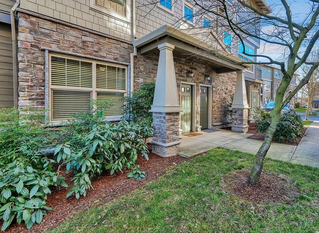 Building Photo - 2BR + 2.1BA Corner Townhome-Style Condo — Dual Primary Suites, Attached Garage & Most Utilities I...
