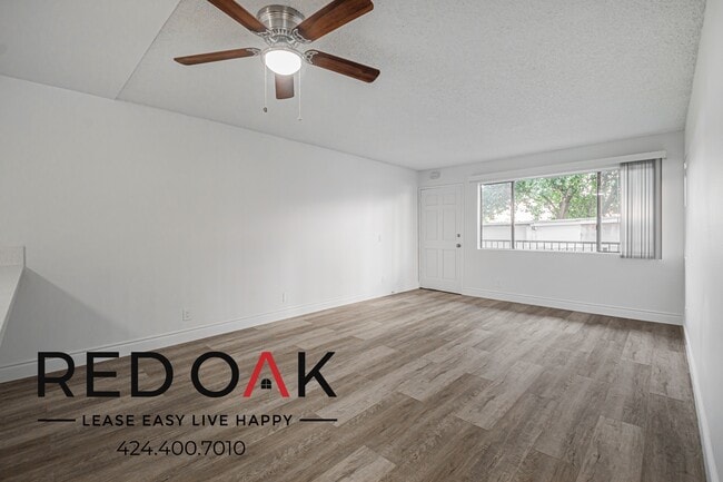 Building Photo - 10133 Pinewood Ave Unit 13