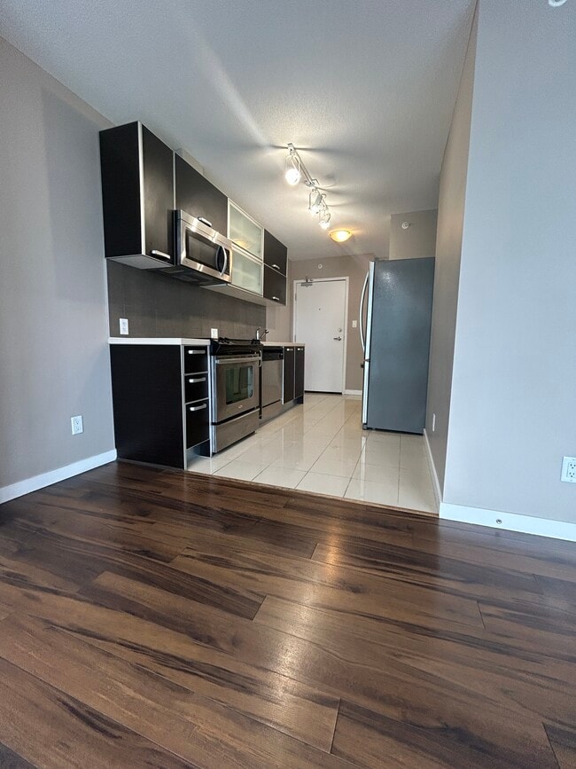 Photo - 9981 Whalley Blvd Unit 3401