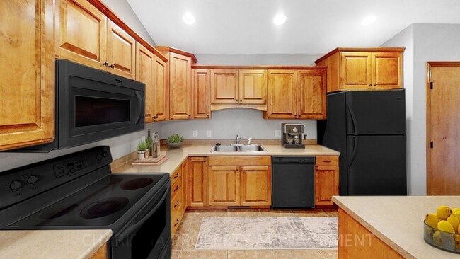 Photo - 3 BD, 2.5 BA TOWNHOME, DOUBLE ATTACHED GARAGE, PET FRIENDLY, WALK OUT DECK, LOTS OF SPACE!