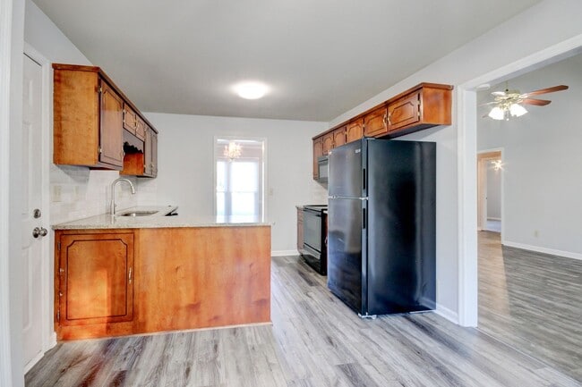 Photo - Amazing Brick Front Ranch Home With Hardwood Flooring and Fireplace