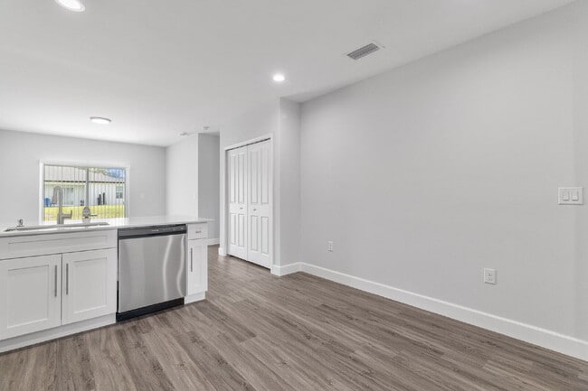 Photo - "Charming 3-Bed, 2-Bath Duplex Gem in Port Charlotte - Your Ideal Home Awaits!"