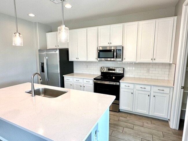 Photo - Fantastic 4BR/3BA Richmond American Larimar in Entrada Del Oro! Features white shaker cabinets, q...