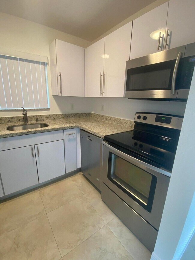 Photo - 560 NE 19th Ave