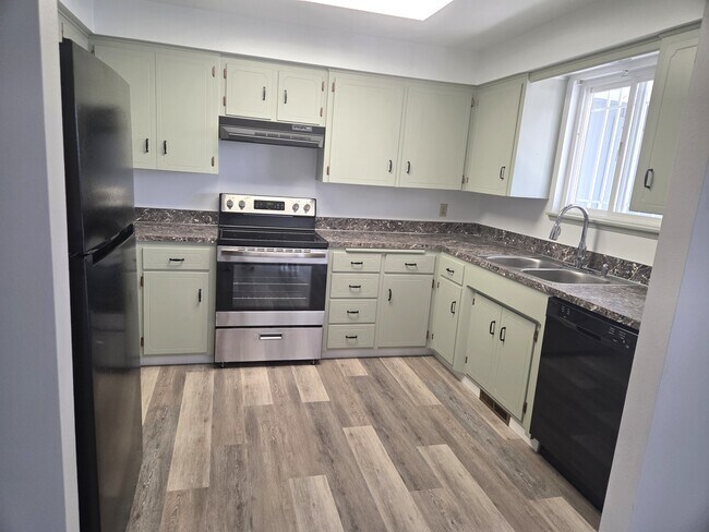 Kitchen - 7002 1/2 Maclaren Way Unit West Valley Duplex