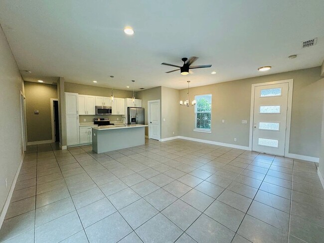 Photo - Beautiful New 3-Bedroom Home with Spacious Layout & 2-Car Garage in Poinciana Villages