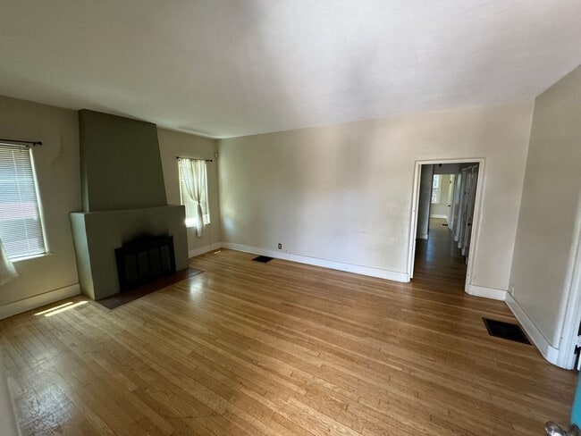 Photo - 4 Br, 2 Ba with kitchen appliances and bas...