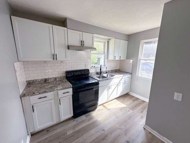 Photo - Beautifully Renovated 3-Bedroom Home with ...