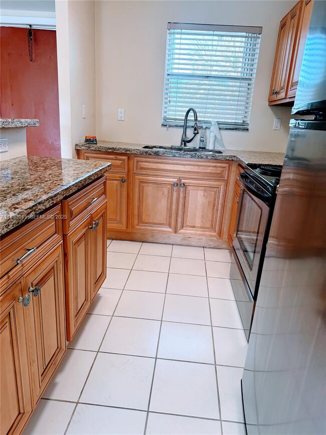 Building Photo - 8595 Sunrise Lakes Blvd Unit 312