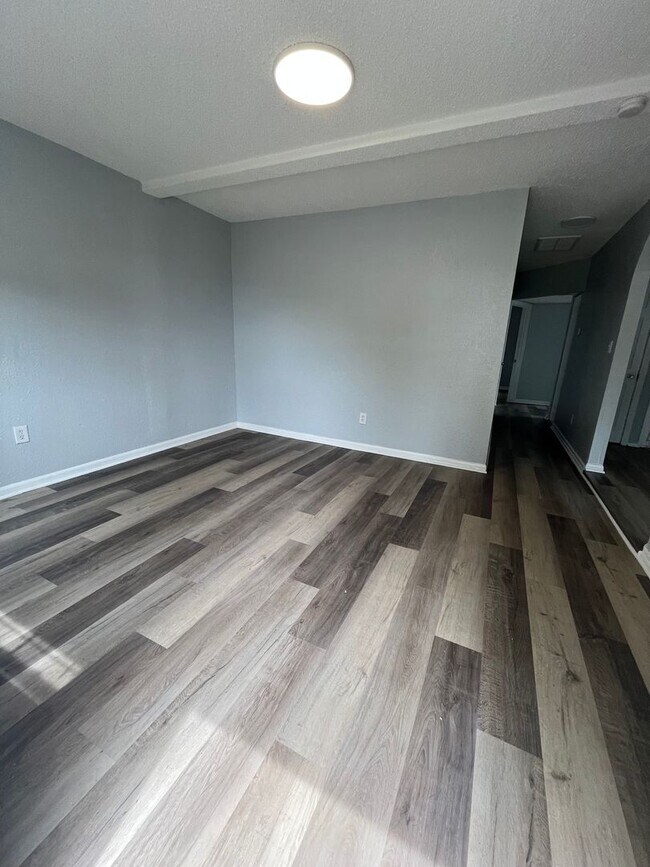 Photo - Nice 3BR/1BA Lakeland Home, Laminate Wood Floors, HUGE Privacy Fenced Backyard!
