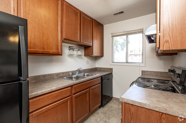 3BR, 2BA - 1,360-1,470SF - Kitchen - Normandy Terrace Apartments