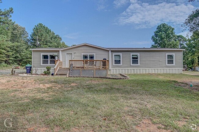 Building Photo - 4BD/2BA home with fenced back yard.