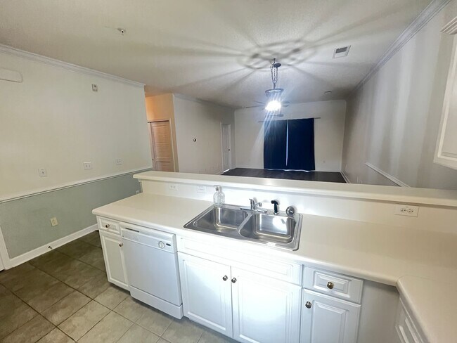 Photo - First Floor, 2 Bedroom, 2 Bath Condo with Screened Patio! Community Pool! Available Now!