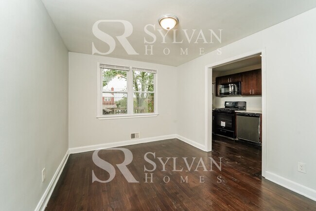 Photo - The living is easy in this 4 bedroom, 2 bathroom townhome