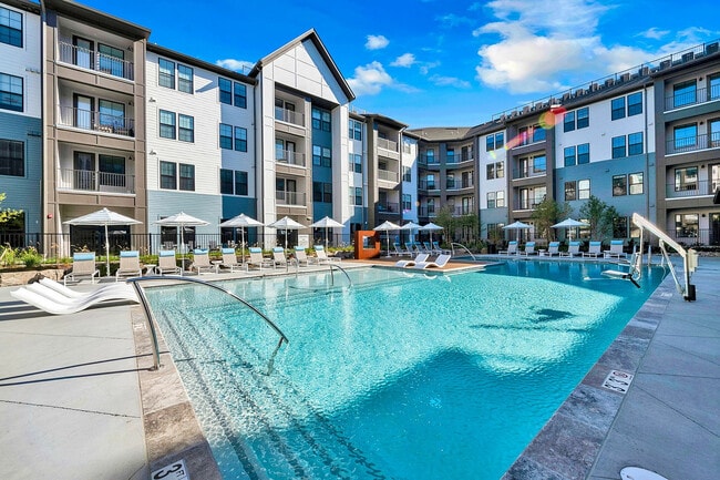 Experience resort-style living with our stunning pool views and contemporary apartment design. - Livano Norfolk