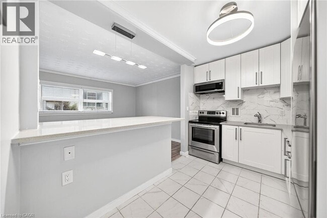 Photo - 237 Mohawk Rd E Unité 7