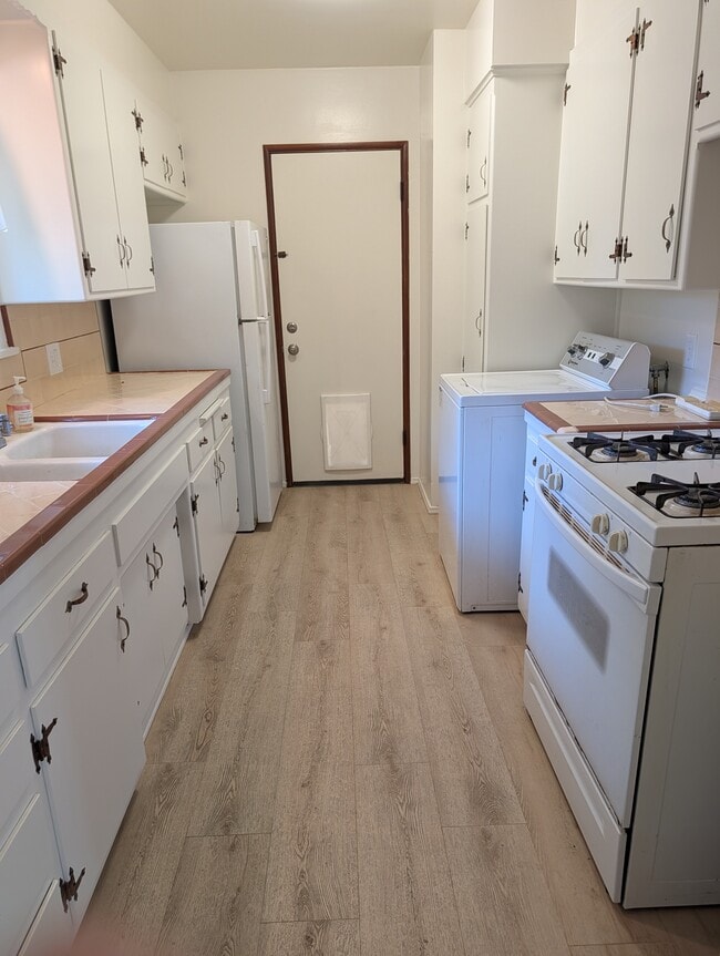 Freshly painted kitchen, new flooring