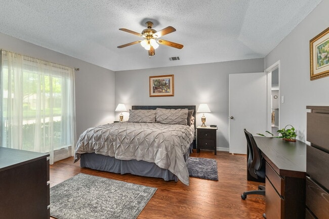 Master bedroom with King bed, walk-in closet, ensuite walk-in shower. Work desk