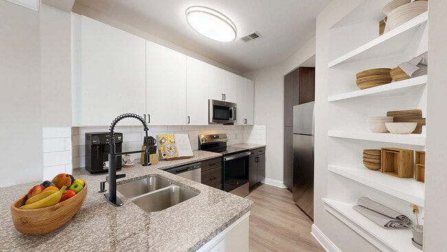 Newly Renovated Kitchen with Stainless Steel Appliances - Creekstone at RTP Apartments