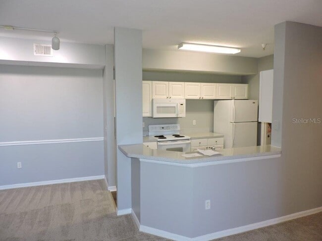 Photo - 5542 Metrowest Blvd Unit 7-208