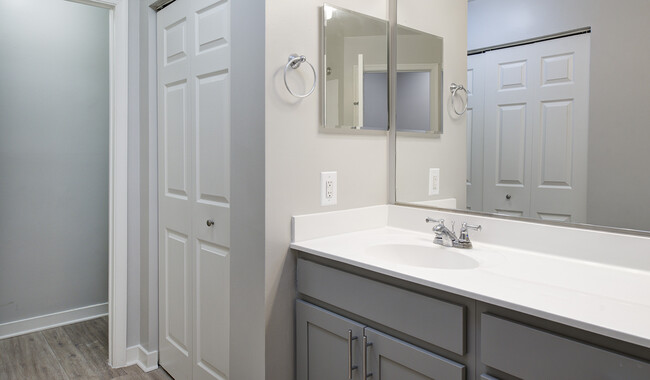 Your bathroom has a large vanity and great lighting to get ready in the morning