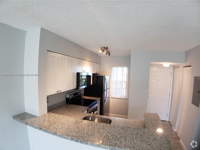 Building Photo - 2106 S Cypress Bend Dr Unit 304 Rental