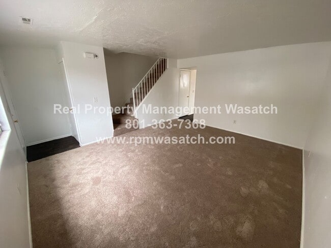 Photo - Check Out This Charming 3 Bedroom 1.5 Bathroom Condo in Midvale Ut!