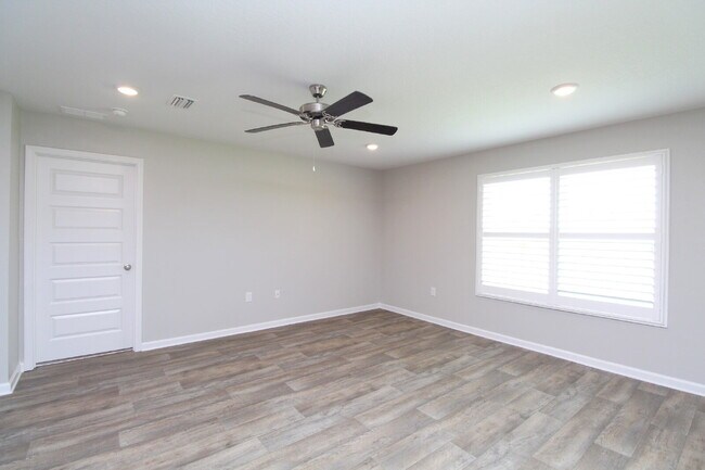 Photo - Coming Available Soon – 4BR/2BA Brick Home with Open Floor Plan, Solar Panels & 2-Car Garage in L...