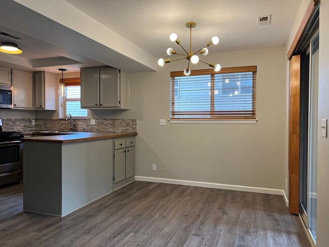 Photo - Water/Sewer/Garbage and landscaping included! A/C too! Unit 11