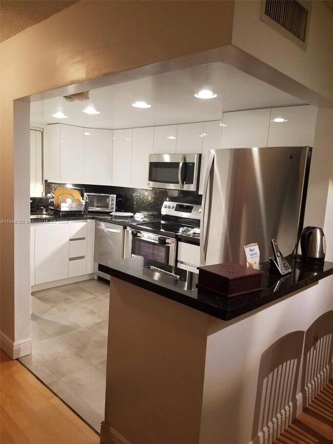 Building Photo - 9371 Fontainebleau Blvd Unit I208 Rental