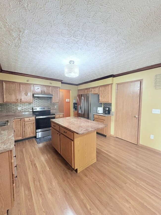 Photo - Furnished 4BR 2 BA Home w/ Covered Patio in Groveport!