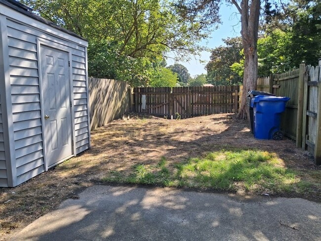 Photo - Charming 3BR Townhouse with Fenced Backyard and Community Pool