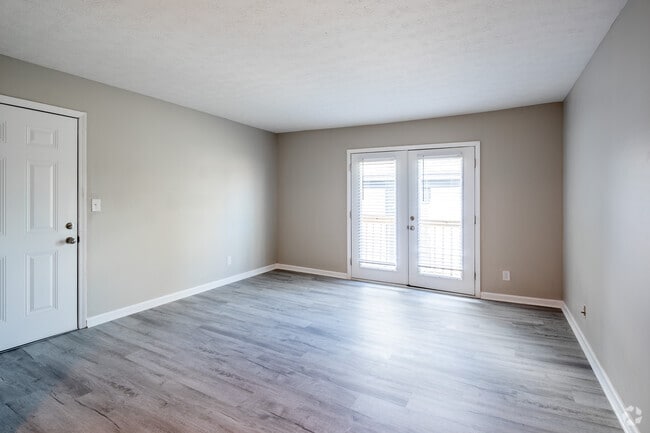 3BR, 1.5BA - 1,047SF - Living Room - The Madison