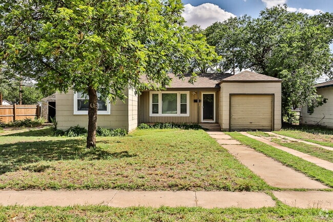 Building Photo - Charming & Cozy 2-Bedroom Oasis Rental