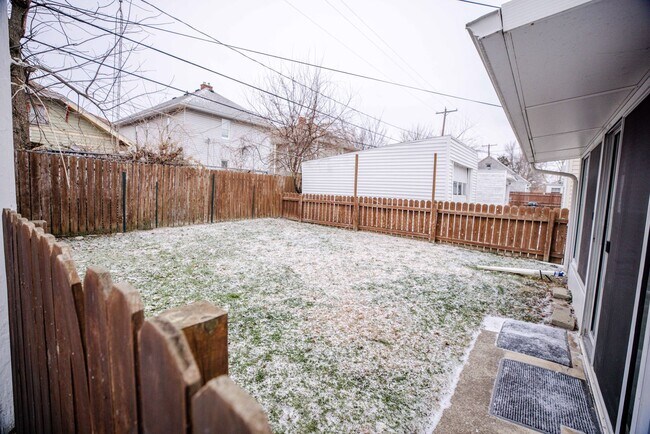 Photo - Beautiful two bedroom home with bonus room, fenced in back yard, garage, and full basement!