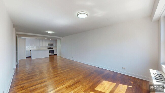 Building Photo - 145 E 16th St Unit 20C Rental